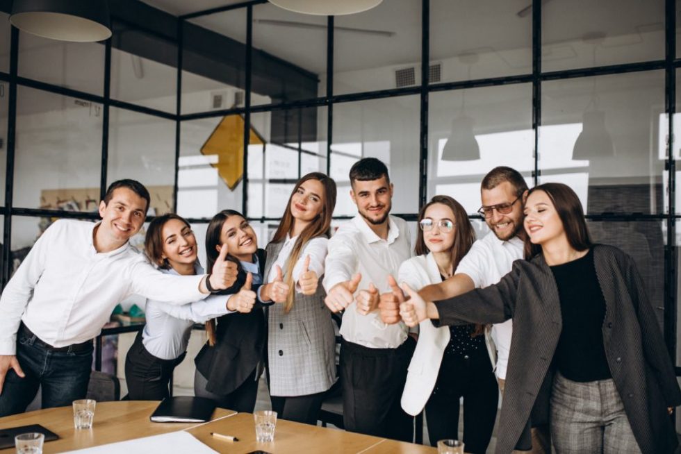 group-people-working-out-business-plan-office